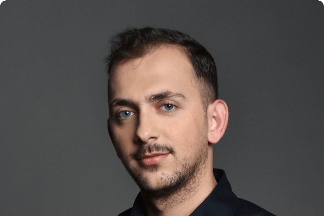 A portrait photo of Veton Klinaku, Raiffeisen Tech Kosovo's Archer Developer, plays a key role in developing the Archer GRC (Government, Risk, Compliance) platform utilized across the RBI network.